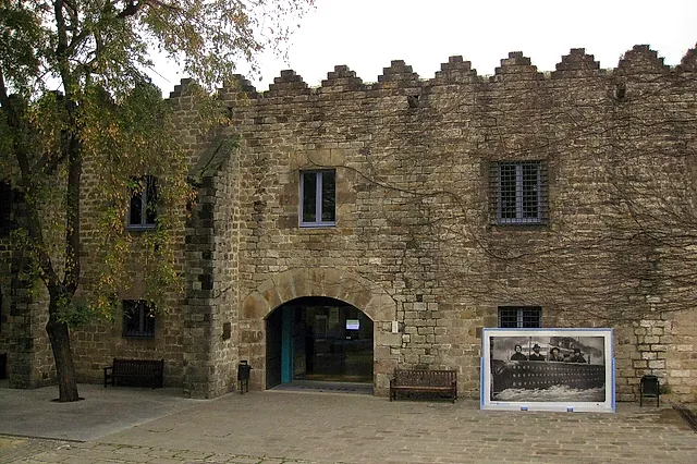 Stone walls and battlements of the Drassanes, the medieval shipyards that house the Maritime Museum
